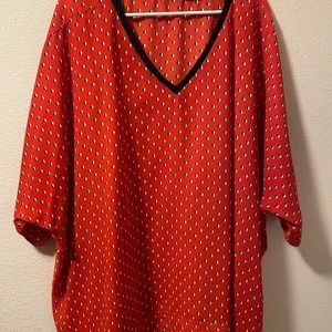 Red geometric blouse